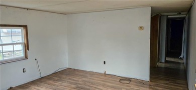 Calling all investors and weekend retreat seekers! If you love on Linn Valley Lakes - Deer Trace Golf Course in Kansas - for sale on GolfHomes.com, golf home, golf lot