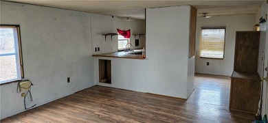 Calling all investors and weekend retreat seekers! If you love on Linn Valley Lakes - Deer Trace Golf Course in Kansas - for sale on GolfHomes.com, golf home, golf lot