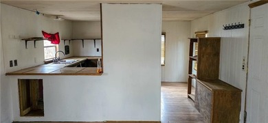 Calling all investors and weekend retreat seekers! If you love on Linn Valley Lakes - Deer Trace Golf Course in Kansas - for sale on GolfHomes.com, golf home, golf lot