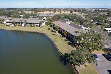 Amazing golf & lake views set the tone for this well-located on Vista Plantation Golf Club in Florida - for sale on GolfHomes.com, golf home, golf lot