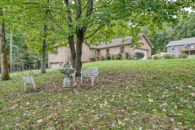 This beautiful brick BASEMENT RANCH home, nestled on 2 lots in on Lake Tansi Village Country Club in Tennessee - for sale on GolfHomes.com, golf home, golf lot