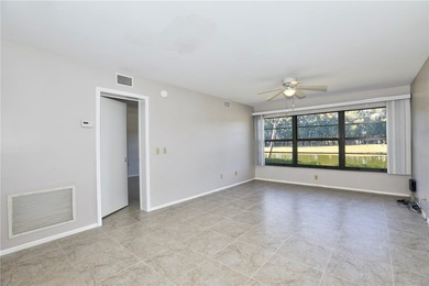 Amazing golf & lake views set the tone for this well-located on Vista Plantation Golf Club in Florida - for sale on GolfHomes.com, golf home, golf lot