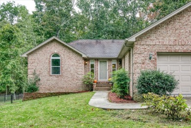 This beautiful brick BASEMENT RANCH home, nestled on 2 lots in on Lake Tansi Village Country Club in Tennessee - for sale on GolfHomes.com, golf home, golf lot