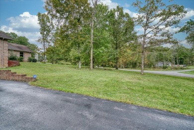 This beautiful brick BASEMENT RANCH home, nestled on 2 lots in on Lake Tansi Village Country Club in Tennessee - for sale on GolfHomes.com, golf home, golf lot