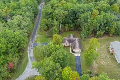 This beautiful brick BASEMENT RANCH home, nestled on 2 lots in on Lake Tansi Village Country Club in Tennessee - for sale on GolfHomes.com, golf home, golf lot