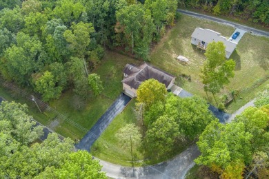 This beautiful brick BASEMENT RANCH home, nestled on 2 lots in on Lake Tansi Village Country Club in Tennessee - for sale on GolfHomes.com, golf home, golf lot