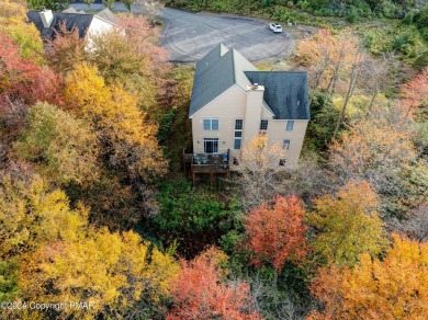 Discover luxury living in this stunning 4-bedroom home located on Pinecrest Lake Golf and Country Club in Pennsylvania - for sale on GolfHomes.com, golf home, golf lot