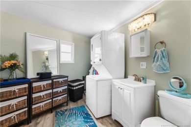 This charming and whimsical beach bungalow is a true gem on Island Dunes Country Club in Florida - for sale on GolfHomes.com, golf home, golf lot