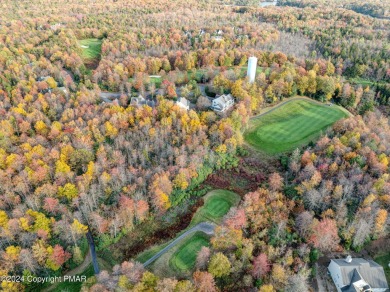 Discover luxury living in this stunning 4-bedroom home located on Pinecrest Lake Golf and Country Club in Pennsylvania - for sale on GolfHomes.com, golf home, golf lot