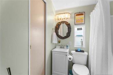 This charming and whimsical beach bungalow is a true gem on Island Dunes Country Club in Florida - for sale on GolfHomes.com, golf home, golf lot