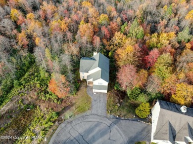 Discover luxury living in this stunning 4-bedroom home located on Pinecrest Lake Golf and Country Club in Pennsylvania - for sale on GolfHomes.com, golf home, golf lot