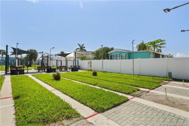 This charming and whimsical beach bungalow is a true gem on Island Dunes Country Club in Florida - for sale on GolfHomes.com, golf home, golf lot