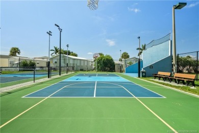 This charming and whimsical beach bungalow is a true gem on Island Dunes Country Club in Florida - for sale on GolfHomes.com, golf home, golf lot