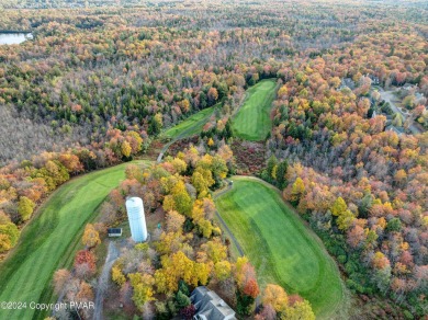 Discover luxury living in this stunning 4-bedroom home located on Pinecrest Lake Golf and Country Club in Pennsylvania - for sale on GolfHomes.com, golf home, golf lot