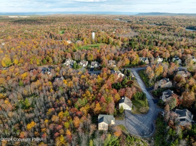 Discover luxury living in this stunning 4-bedroom home located on Pinecrest Lake Golf and Country Club in Pennsylvania - for sale on GolfHomes.com, golf home, golf lot