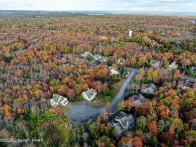 Discover luxury living in this stunning 4-bedroom home located on Pinecrest Lake Golf and Country Club in Pennsylvania - for sale on GolfHomes.com, golf home, golf lot