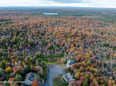 Discover luxury living in this stunning 4-bedroom home located on Pinecrest Lake Golf and Country Club in Pennsylvania - for sale on GolfHomes.com, golf home, golf lot