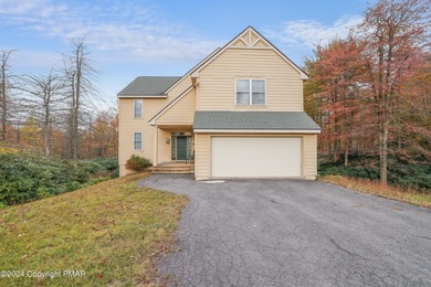 Discover luxury living in this stunning 4-bedroom home located on Pinecrest Lake Golf and Country Club in Pennsylvania - for sale on GolfHomes.com, golf home, golf lot