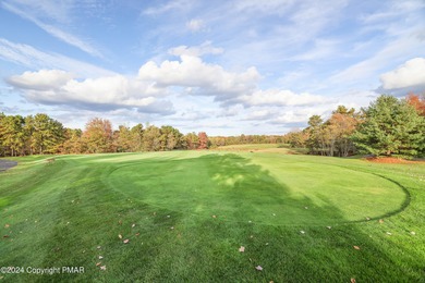 Discover luxury living in this stunning 4-bedroom home located on Pinecrest Lake Golf and Country Club in Pennsylvania - for sale on GolfHomes.com, golf home, golf lot