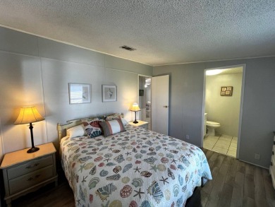 Welcome to your dream oasis! This stunning 2-bedroom, 2-bathroom on Lake Henry Golf Club in Florida - for sale on GolfHomes.com, golf home, golf lot