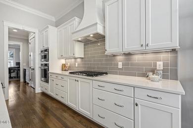 Absolutely stunning, custom home on a beautifully landscaped on The Club At Twelve Oaks in North Carolina - for sale on GolfHomes.com, golf home, golf lot