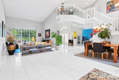 Elegant two-story home located in the prestigious Weston Hills on Weston Hills Country Club in Florida - for sale on GolfHomes.com, golf home, golf lot