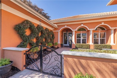 Meticulously landscaped courtyard entry, sculpted gardens and on Bent Pine Golf Club in Florida - for sale on GolfHomes.com, golf home, golf lot