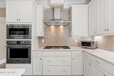Experience vibrant community living at 6441 Saxon Meadow Drive on Cape Fear National At Brunswick Forest in North Carolina - for sale on GolfHomes.com, golf home, golf lot