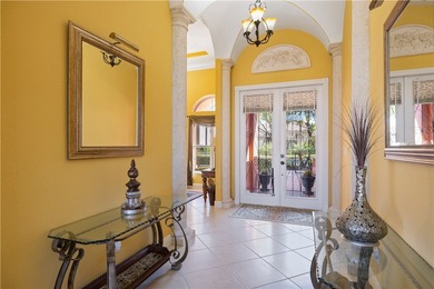 Meticulously landscaped courtyard entry, sculpted gardens and on Bent Pine Golf Club in Florida - for sale on GolfHomes.com, golf home, golf lot