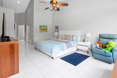 Elegant two-story home located in the prestigious Weston Hills on Weston Hills Country Club in Florida - for sale on GolfHomes.com, golf home, golf lot