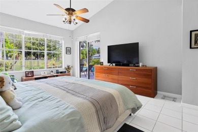 Elegant two-story home located in the prestigious Weston Hills on Weston Hills Country Club in Florida - for sale on GolfHomes.com, golf home, golf lot