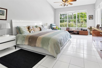 Elegant two-story home located in the prestigious Weston Hills on Weston Hills Country Club in Florida - for sale on GolfHomes.com, golf home, golf lot