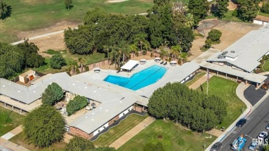 Welcome to this charming 2-bedroom, 1-bath turnkey beauty on Sundale Country Club in California - for sale on GolfHomes.com, golf home, golf lot