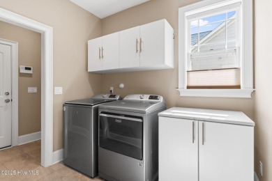 Experience vibrant community living at 6441 Saxon Meadow Drive on Cape Fear National At Brunswick Forest in North Carolina - for sale on GolfHomes.com, golf home, golf lot