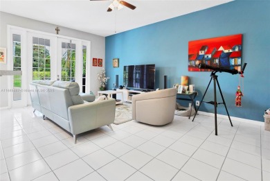 Elegant two-story home located in the prestigious Weston Hills on Weston Hills Country Club in Florida - for sale on GolfHomes.com, golf home, golf lot