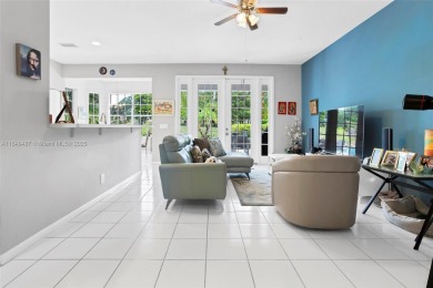 Elegant two-story home located in the prestigious Weston Hills on Weston Hills Country Club in Florida - for sale on GolfHomes.com, golf home, golf lot