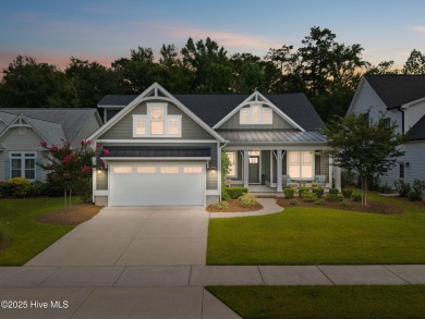 Experience vibrant community living at 6441 Saxon Meadow Drive on Cape Fear National At Brunswick Forest in North Carolina - for sale on GolfHomes.com, golf home, golf lot
