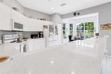 Elegant two-story home located in the prestigious Weston Hills on Weston Hills Country Club in Florida - for sale on GolfHomes.com, golf home, golf lot