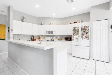 Elegant two-story home located in the prestigious Weston Hills on Weston Hills Country Club in Florida - for sale on GolfHomes.com, golf home, golf lot