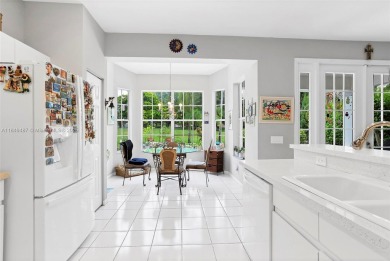 Elegant two-story home located in the prestigious Weston Hills on Weston Hills Country Club in Florida - for sale on GolfHomes.com, golf home, golf lot