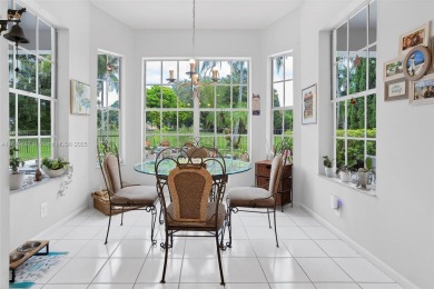 Elegant two-story home located in the prestigious Weston Hills on Weston Hills Country Club in Florida - for sale on GolfHomes.com, golf home, golf lot