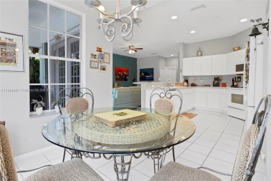 Elegant two-story home located in the prestigious Weston Hills on Weston Hills Country Club in Florida - for sale on GolfHomes.com, golf home, golf lot