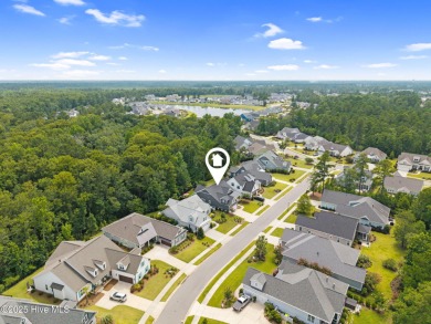 Experience vibrant community living at 6441 Saxon Meadow Drive on Cape Fear National At Brunswick Forest in North Carolina - for sale on GolfHomes.com, golf home, golf lot