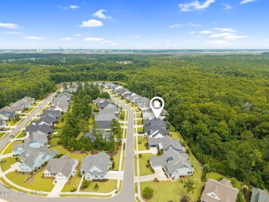 Experience vibrant community living at 6441 Saxon Meadow Drive on Cape Fear National At Brunswick Forest in North Carolina - for sale on GolfHomes.com, golf home, golf lot
