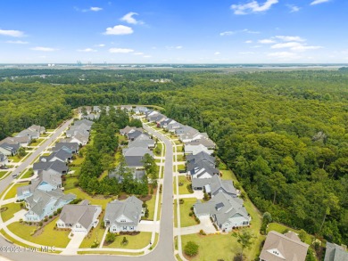 Experience vibrant community living at 6441 Saxon Meadow Drive on Cape Fear National At Brunswick Forest in North Carolina - for sale on GolfHomes.com, golf home, golf lot