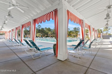 Experience vibrant community living at 6441 Saxon Meadow Drive on Cape Fear National At Brunswick Forest in North Carolina - for sale on GolfHomes.com, golf home, golf lot