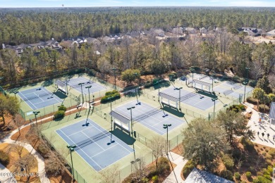 Experience vibrant community living at 6441 Saxon Meadow Drive on Cape Fear National At Brunswick Forest in North Carolina - for sale on GolfHomes.com, golf home, golf lot