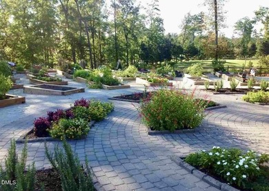 Absolutely stunning, custom home on a beautifully landscaped on The Club At Twelve Oaks in North Carolina - for sale on GolfHomes.com, golf home, golf lot