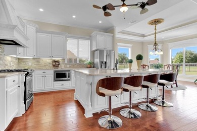 Discover an exceptional residence where sophisticated living on Hide-A-Way Lake Golf Course in Texas - for sale on GolfHomes.com, golf home, golf lot