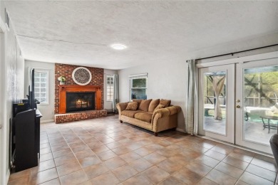 Located in the sought-after Country Club Estates, this 4-bedroom on DeLand Country Club in Florida - for sale on GolfHomes.com, golf home, golf lot